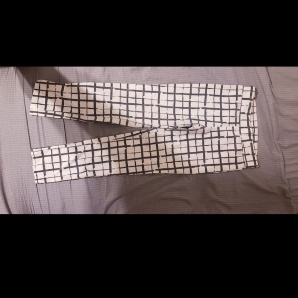 White and Black plaid pants.